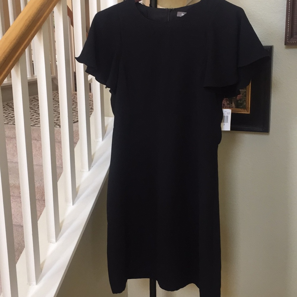Neiman Marcus Black dress.